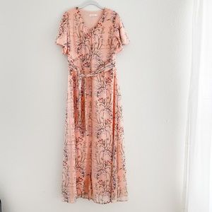 Floral dress in a peach color from Roolee